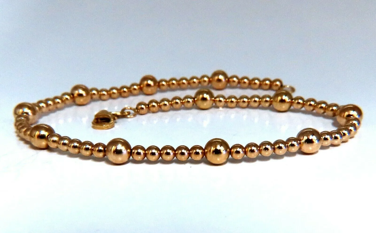 14kt Alternated bull bead bracelet hollow 9.5 inch 4.8mm