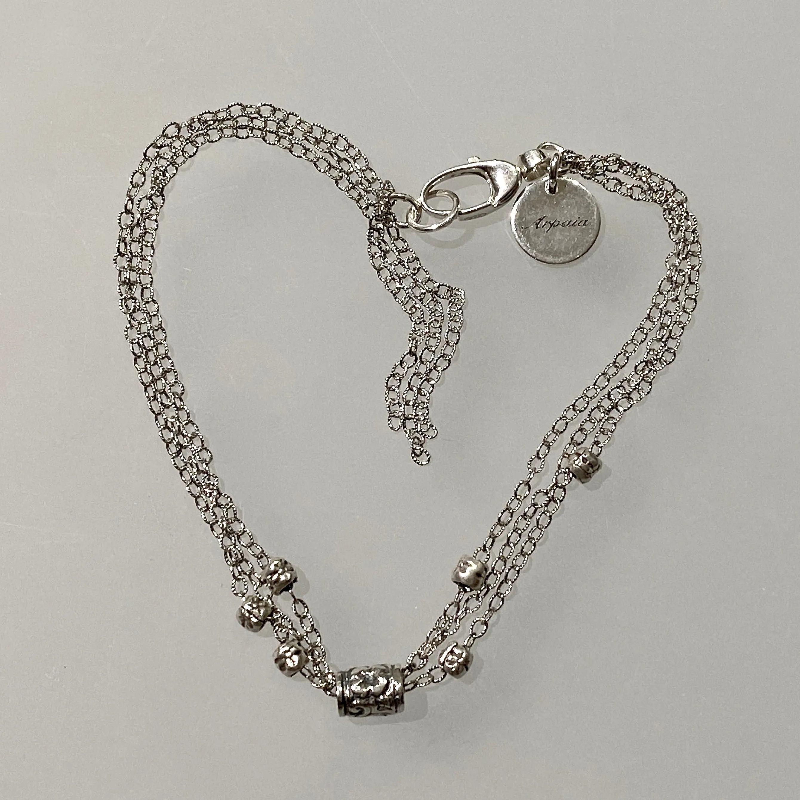 7.5" Antiqued Silver Flower Bead Bracelet with Tassel by Arpaia