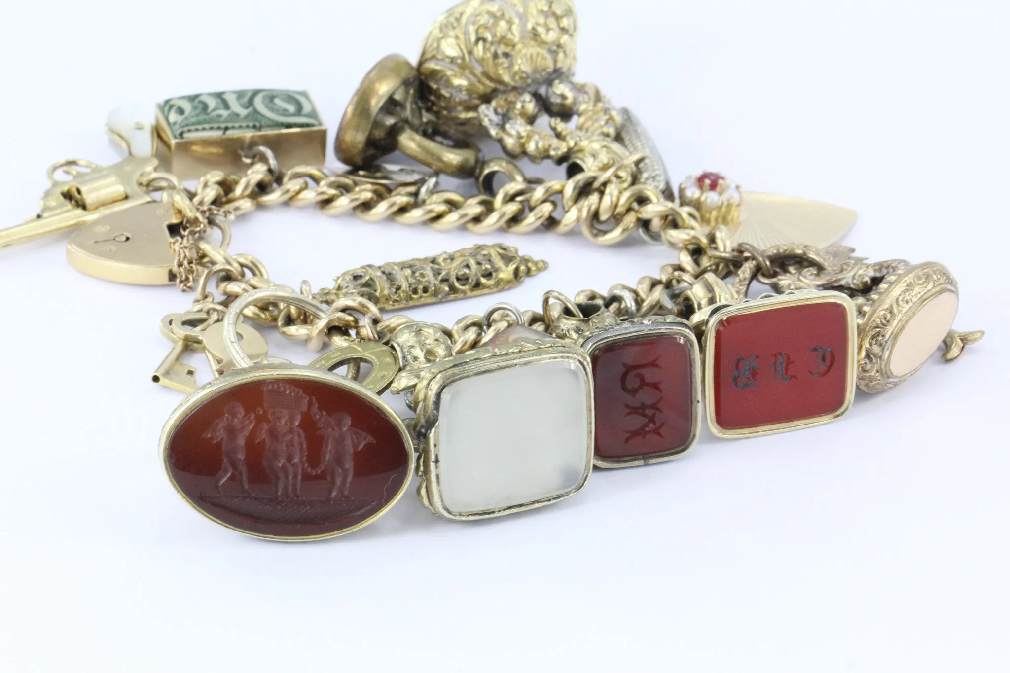 Antique 18K Gold English Tassie Seal heavy Loaded Charm Bracelet