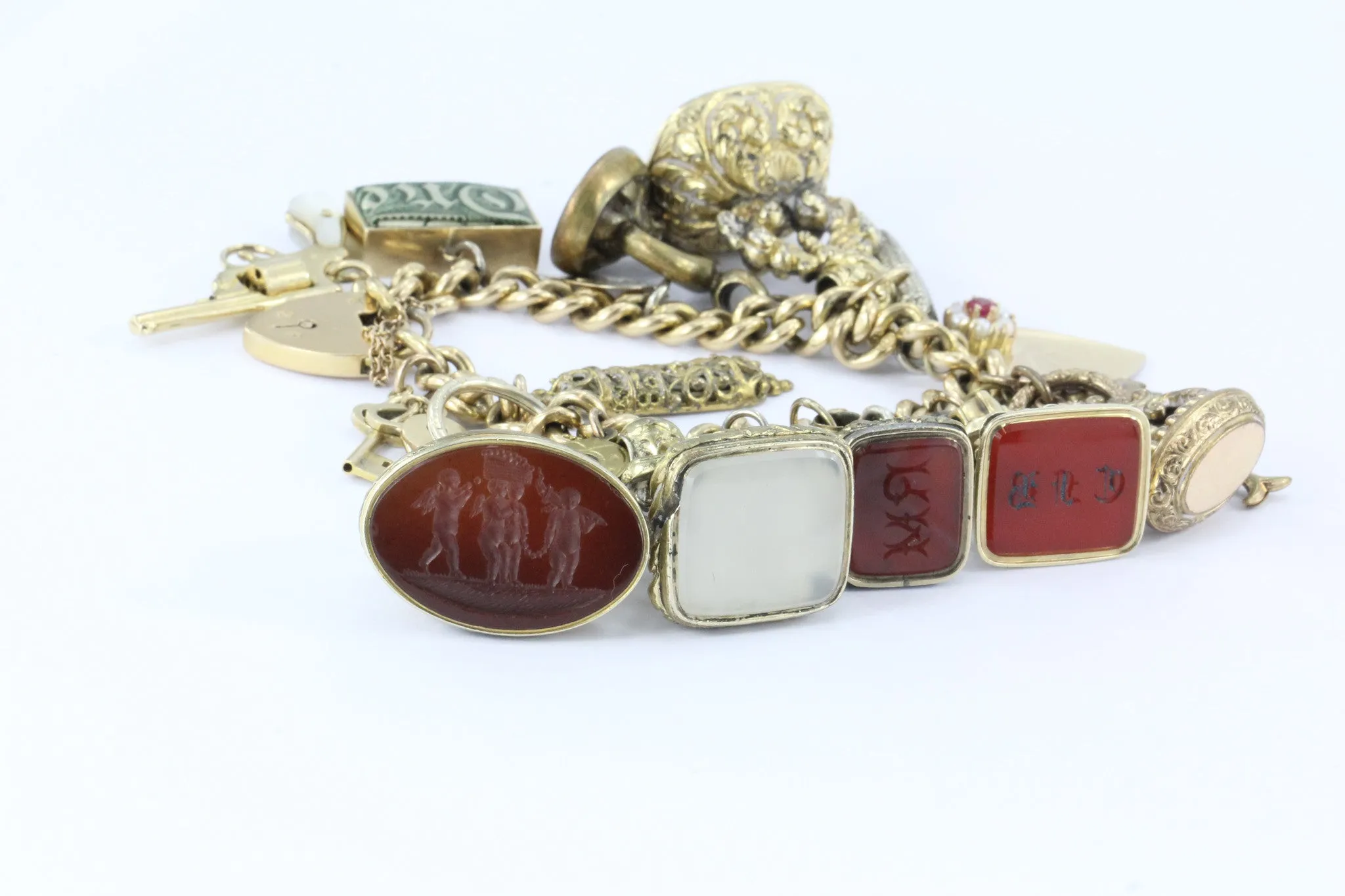 Antique 18K Gold English Tassie Seal heavy Loaded Charm Bracelet