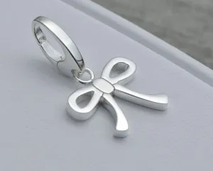BOW CHARM IN STERLING SILVER