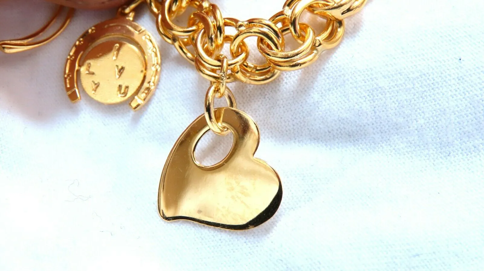 Eight Charms Link Bracelet 14kt gold 7 inch 43gm
