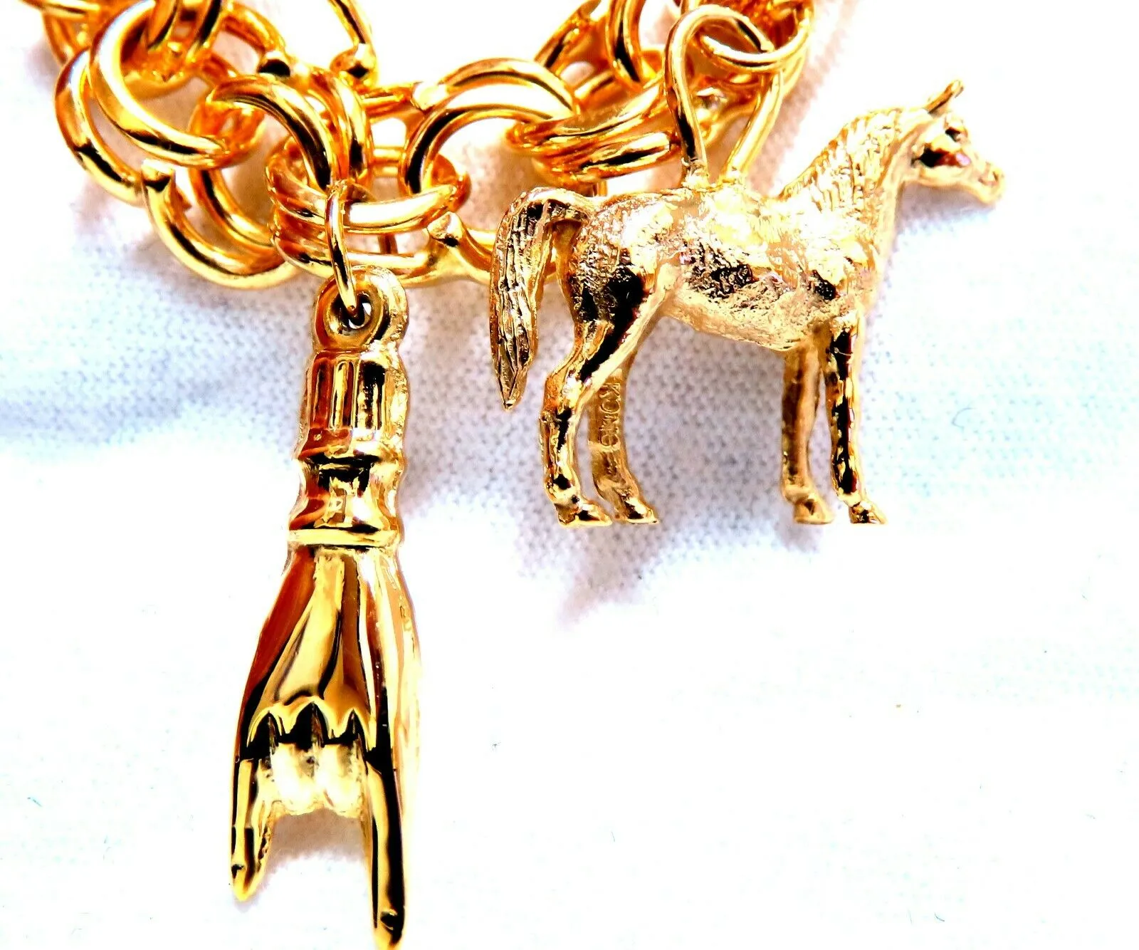 Eight Charms Link Bracelet 14kt gold 7 inch 43gm