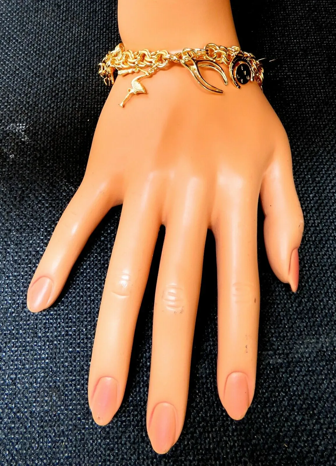 Eight Charms Link Bracelet 14kt gold 7 inch 43gm