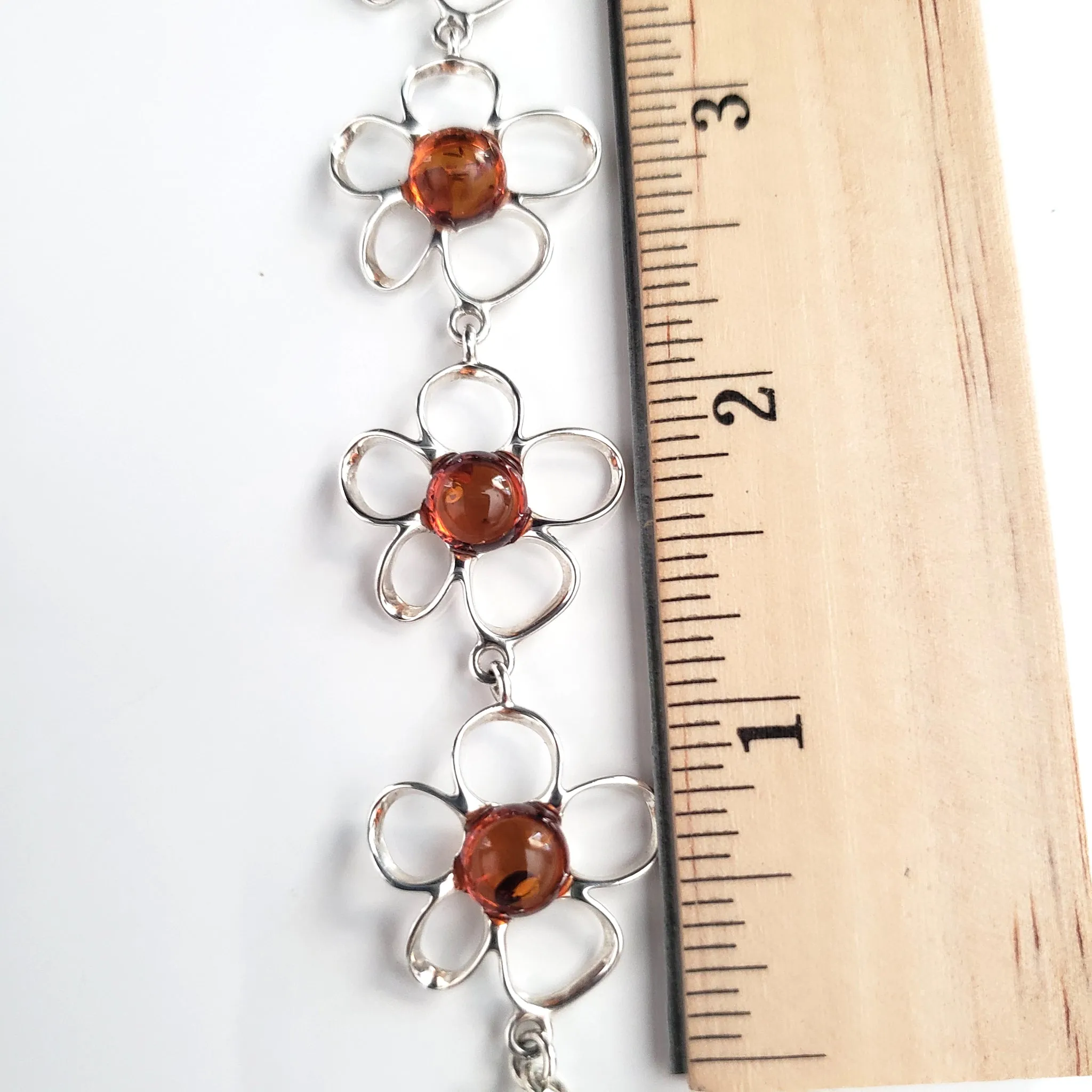 Silver Flower with Natural Amber Link Bracelet