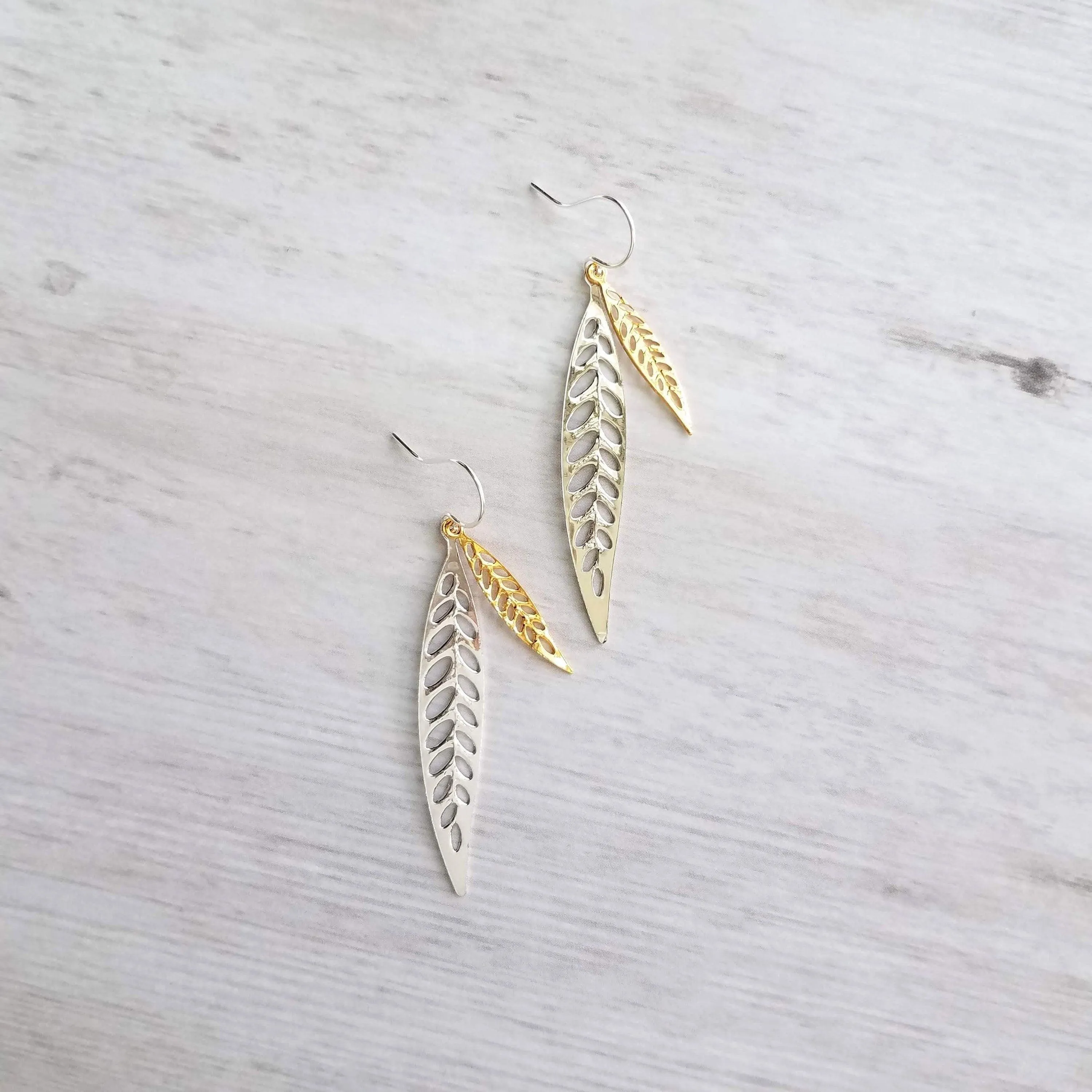 Silver Gold Leaf Earrings, long narrow leaf earrings, silver leaves, filigree leaf earring, silver leaf earring, cut out leaf earring, thin