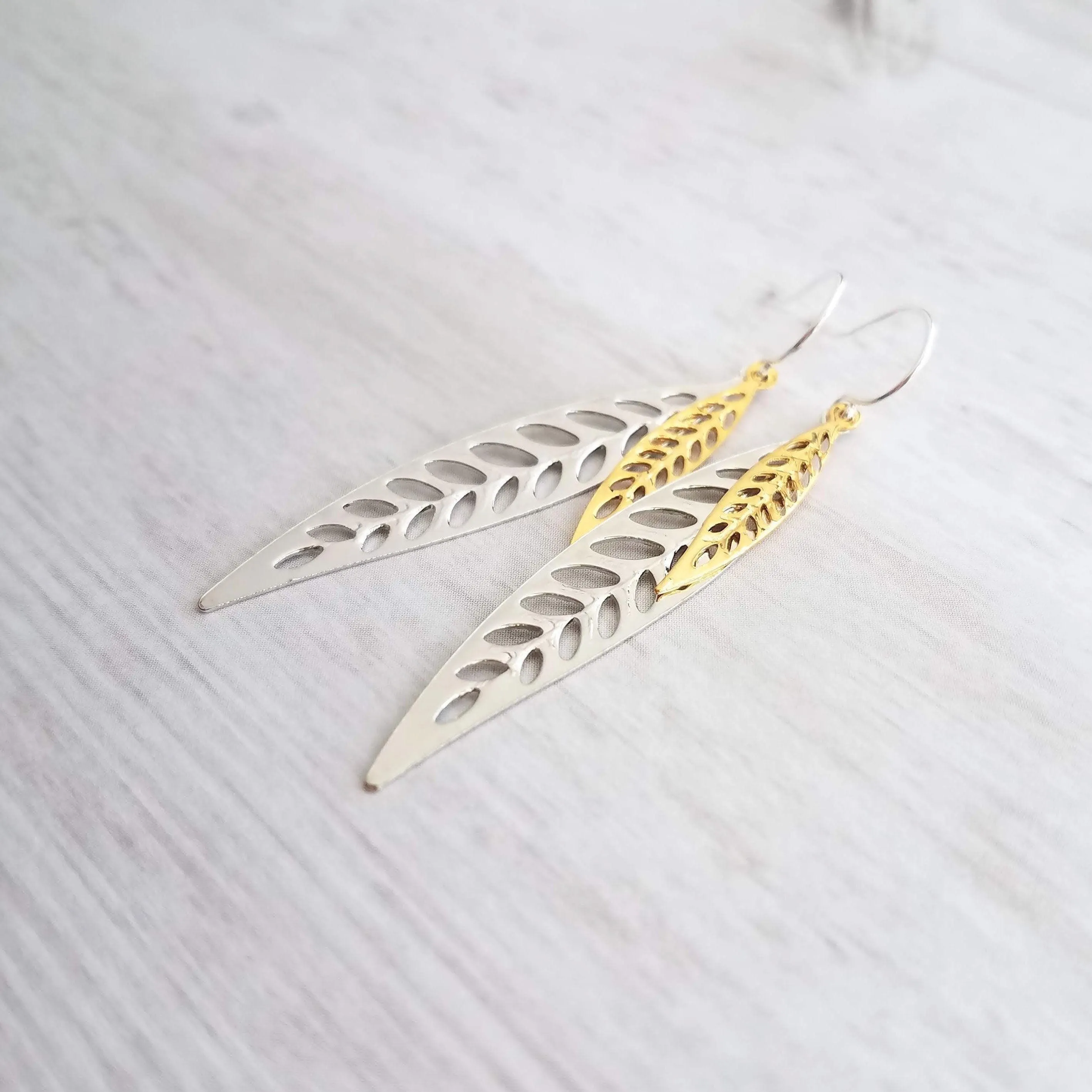 Silver Gold Leaf Earrings, long narrow leaf earrings, silver leaves, filigree leaf earring, silver leaf earring, cut out leaf earring, thin