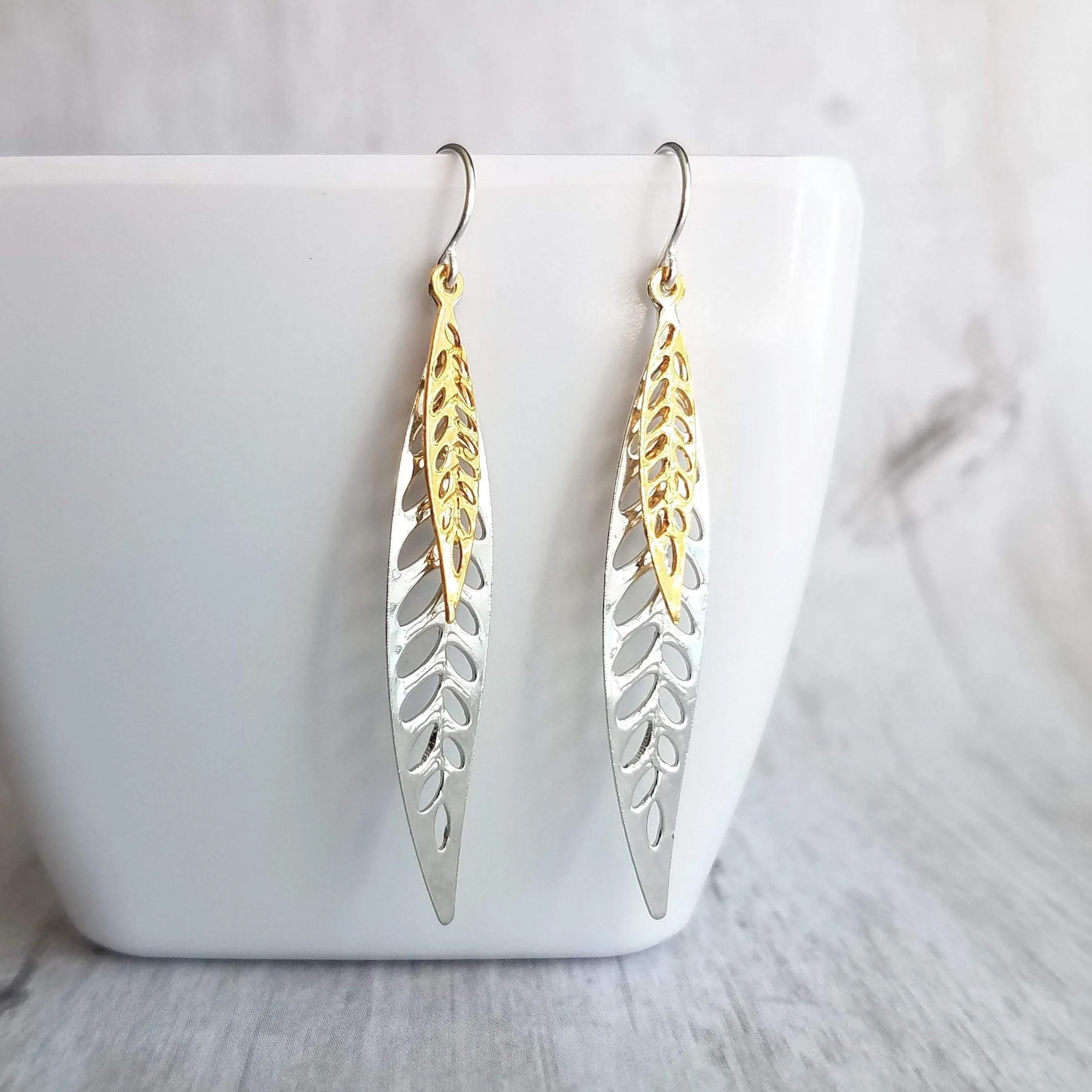 Silver Gold Leaf Earrings, long narrow leaf earrings, silver leaves, filigree leaf earring, silver leaf earring, cut out leaf earring, thin