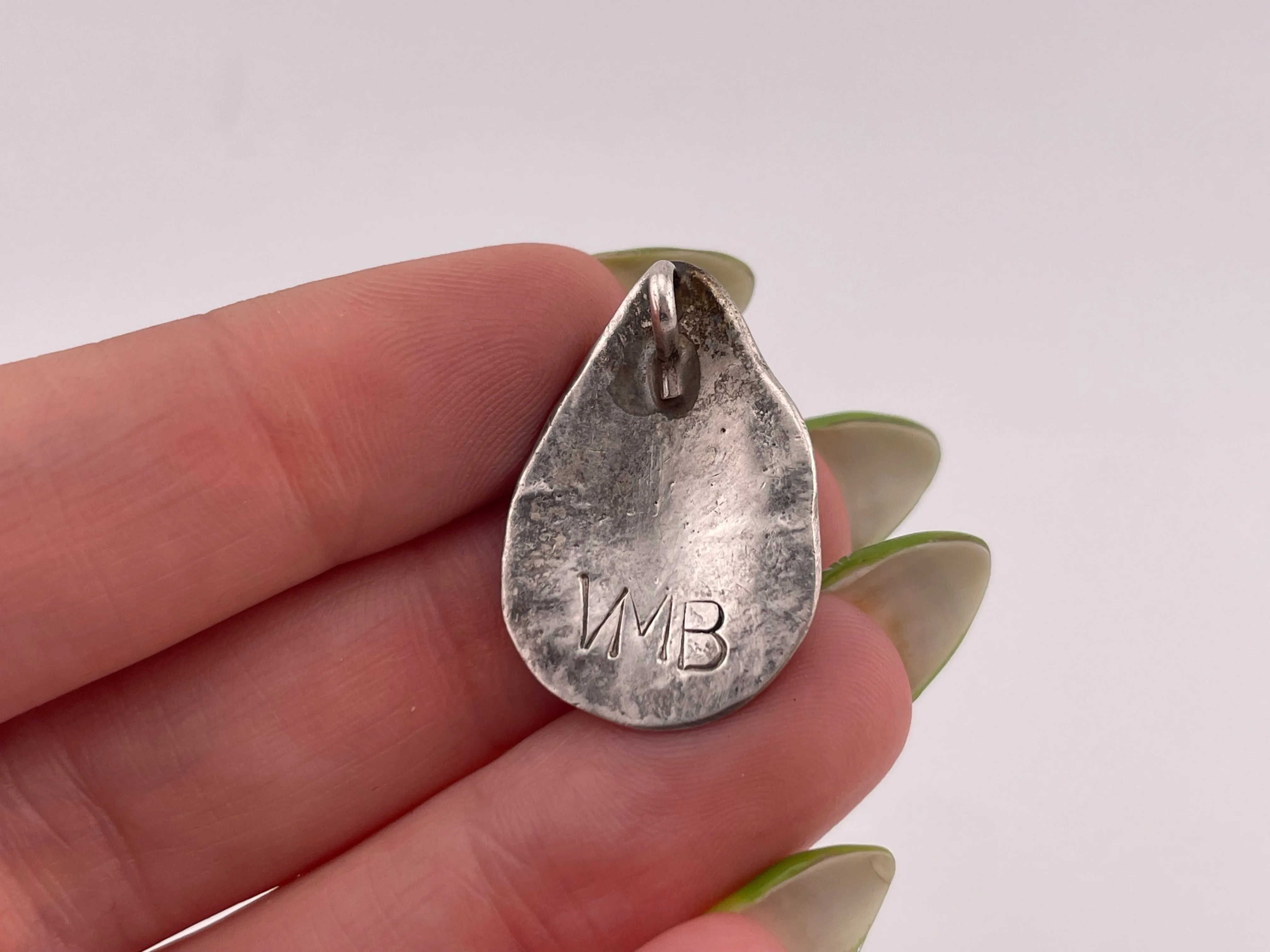 sterling silver artist signed Victor Moses Begay turquoise & mother of pearl pendant