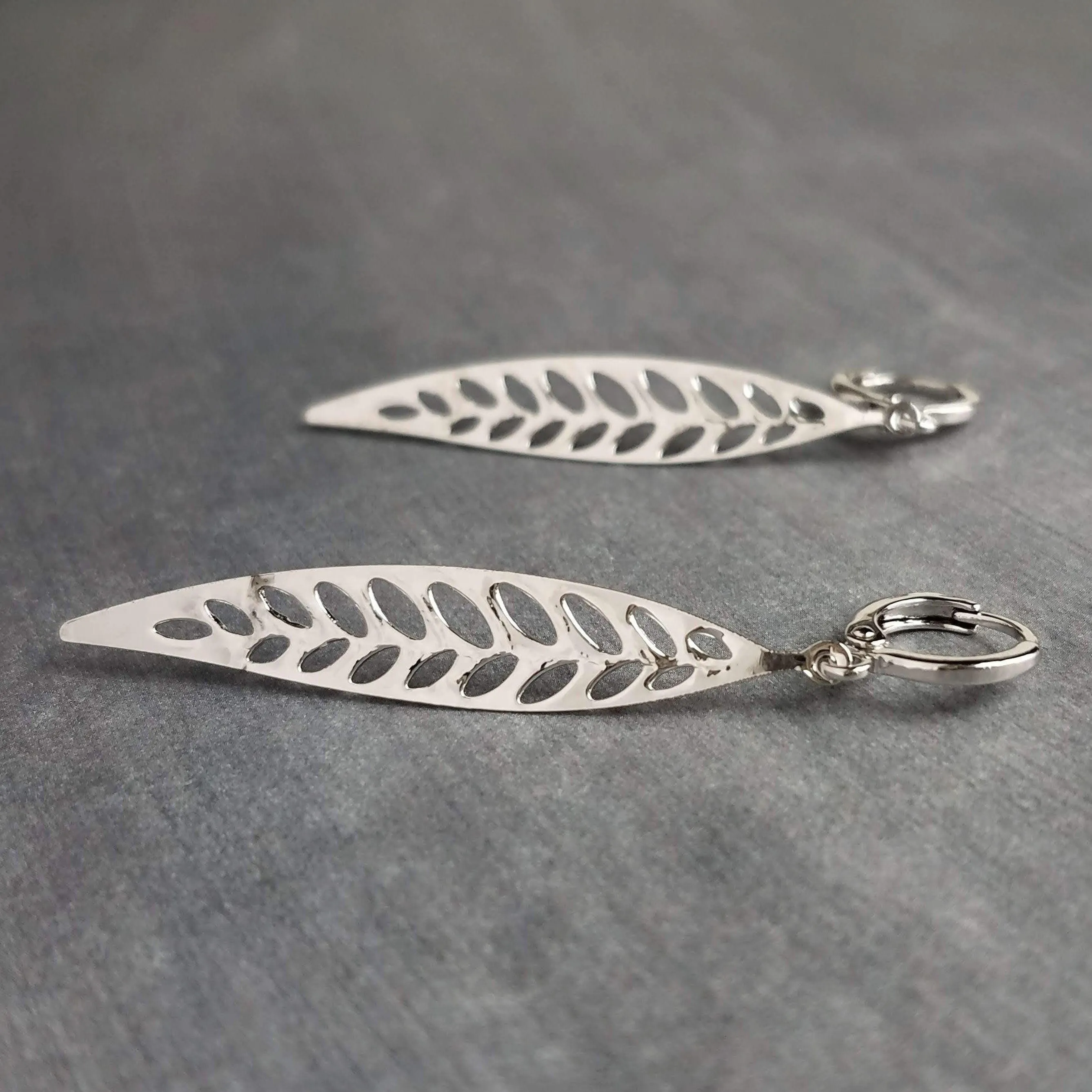 Thin Silver Leaf Earrings, long narrow leaf earrings, filigree leaves earring, long silver leaf earring, cut out leaf earring, huggie hoops